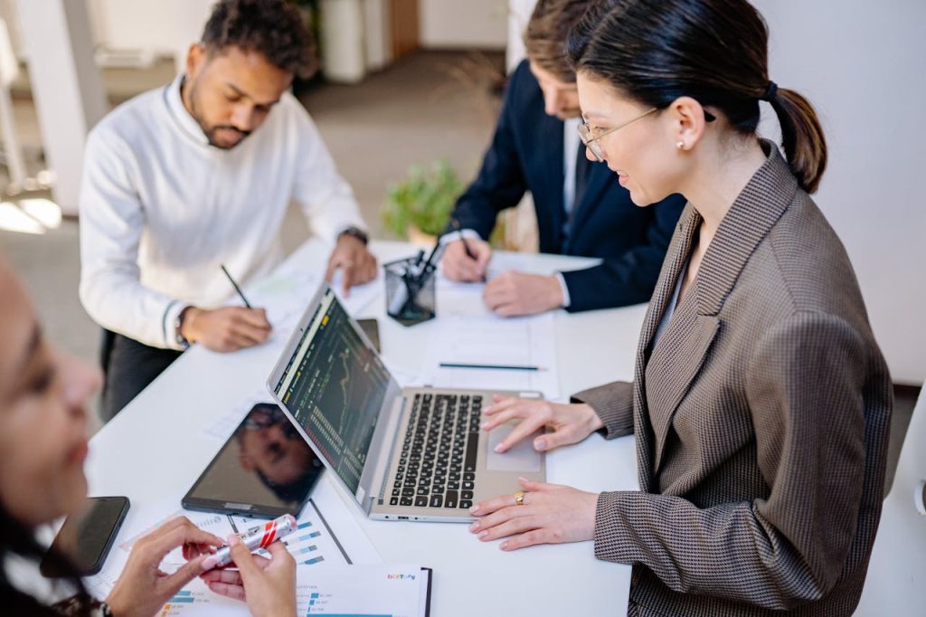 Business team collaborating during a market analysis session.