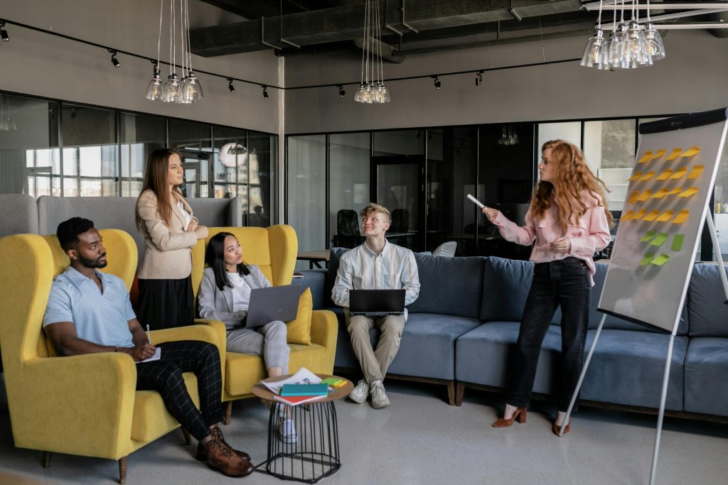 Professional team conducting a brainstorming session in a modern office setting.